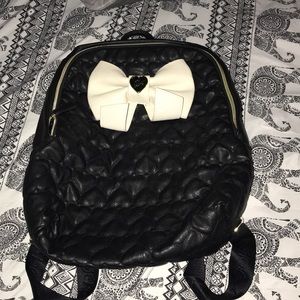 Beaty Johnson Black backpack w/ white bow